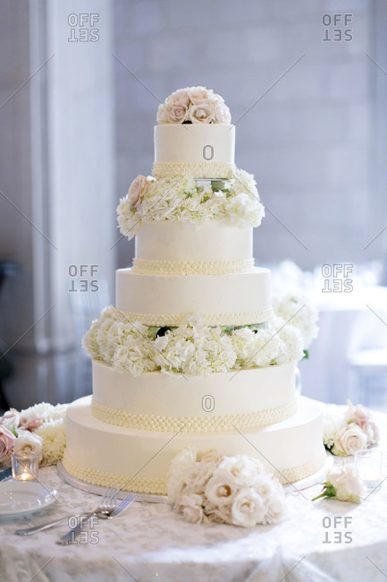 Five-tier wedding cake at wedding reception