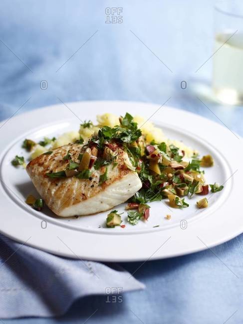 Seared white fish with olive relish and lemon mashed potatoes