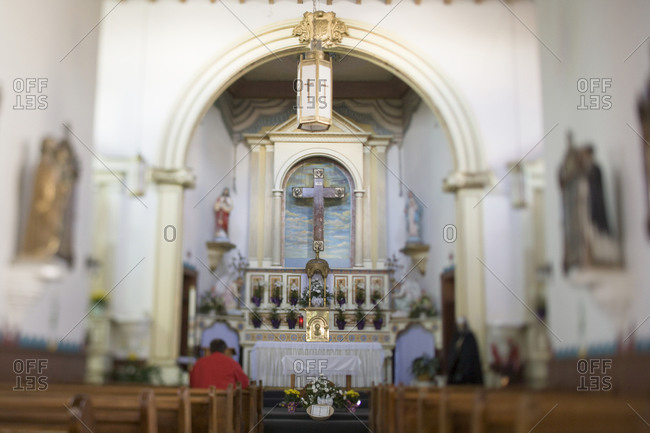 Altar and pews in Catholic church