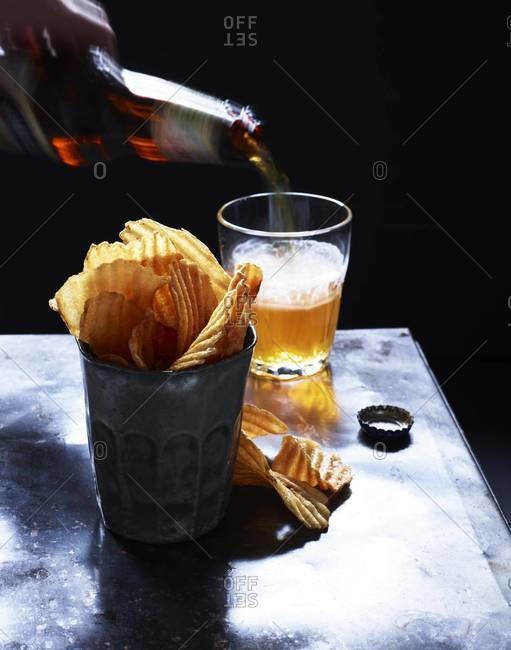 Homemade chips and a beer