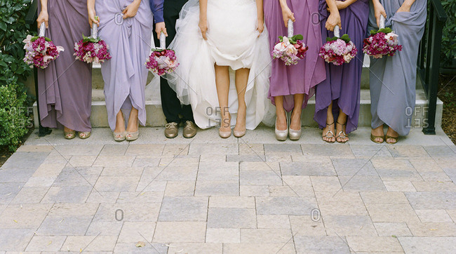 Feet and legs of wedding party