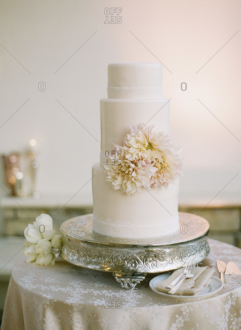 Layered wedding cake on silver platter