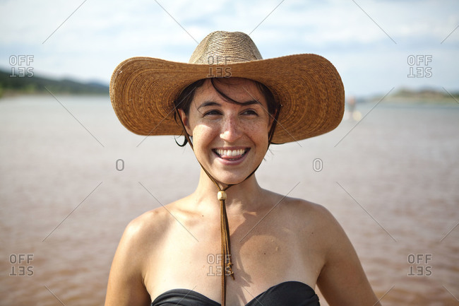 Portrait of a woman in straw hat