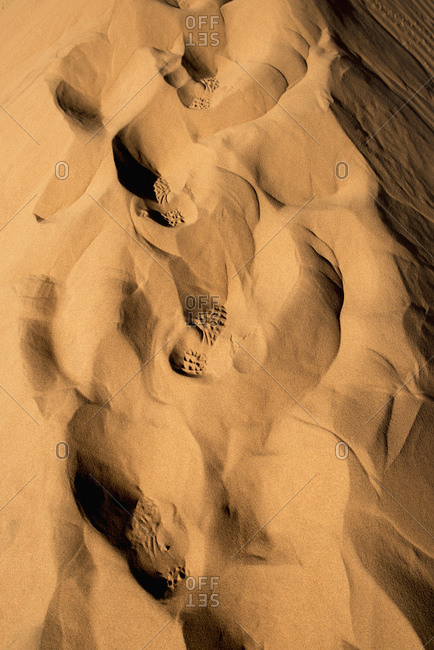 Footprints in the sand dune, Sossusvlei, Namibia, Africa