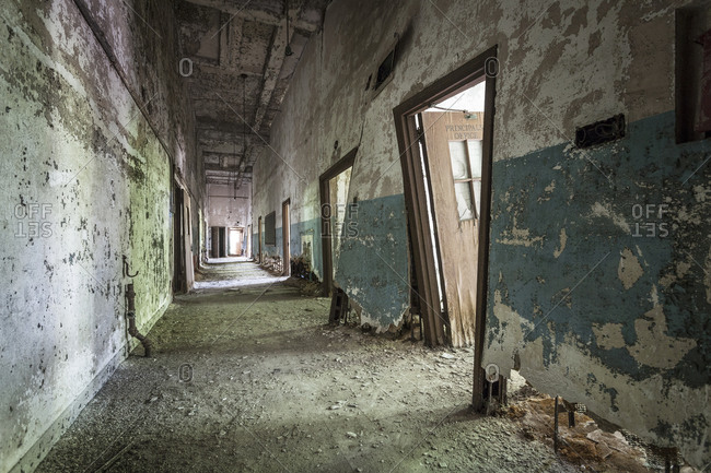 Ruined school hallway of a haunted asylum