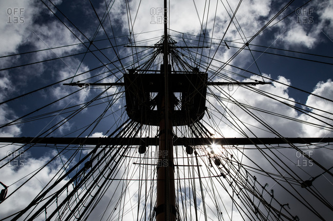 Low angle view of a ship\'s mast and rigging