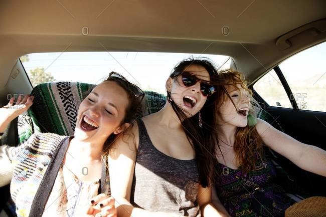 Women singing in a car