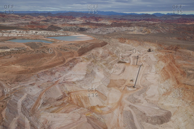 A strip mine disrupts the landscape in the Nevada desert