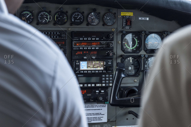 Flight instruments on the console dashboard of a light plane