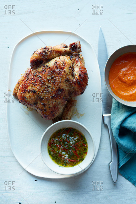 Roasted chicken served with olive oil sauce