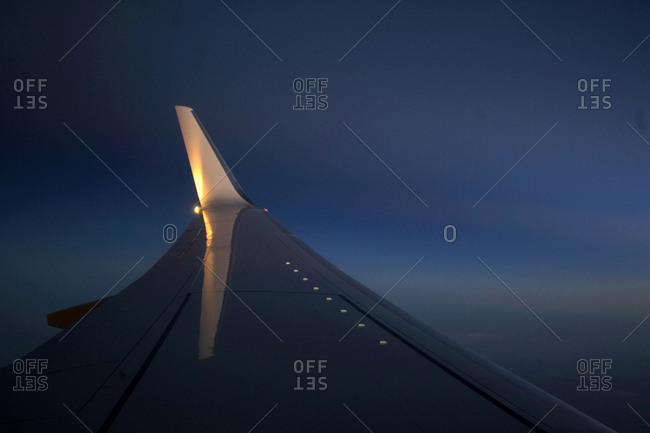 Wing of an airplane in the air