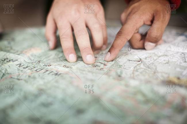 Two men planning with map
