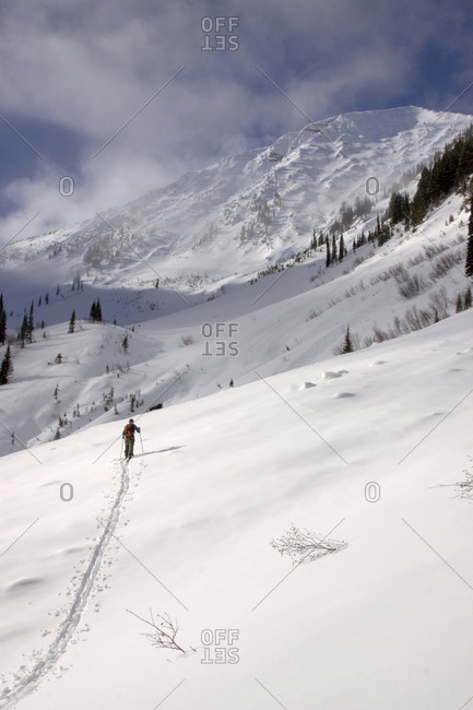 A backcountry skier breaks trail in the Rescue Creek drainage basin below Mt. Penrose, Montana