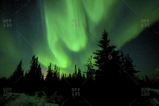 The northern lights move around in the winter sky