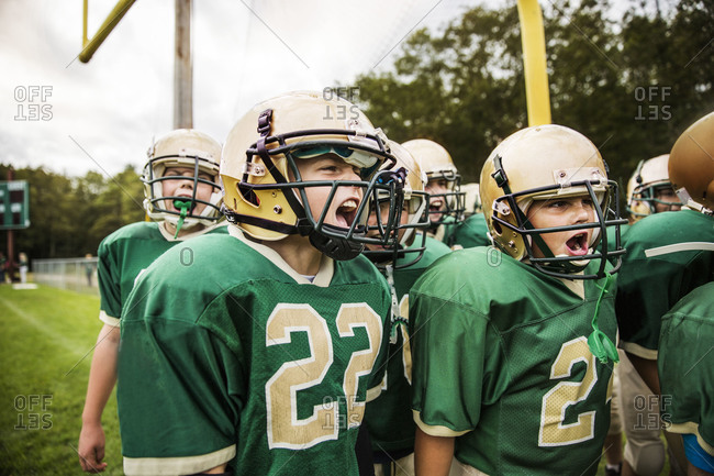 Young football players getting psyched for a game