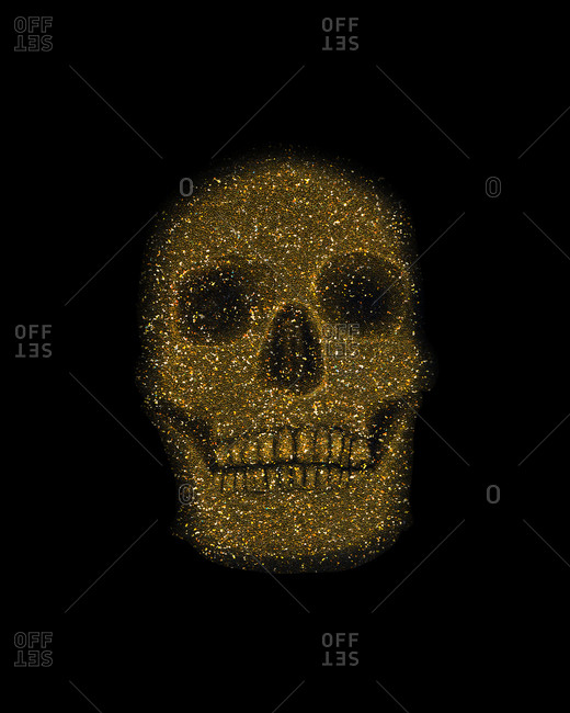 Golden skull on black background