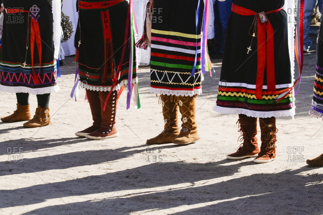 Tewa women dancers wearing moccasins in Tortugas Pueblo, New Mexico, USA