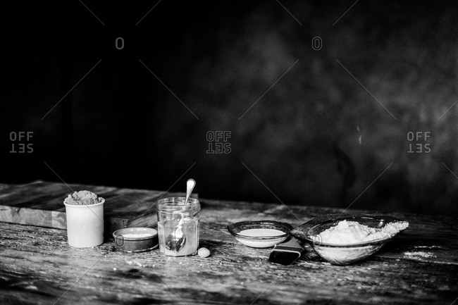 Ingredients of a pie pastry set out on a rustic table