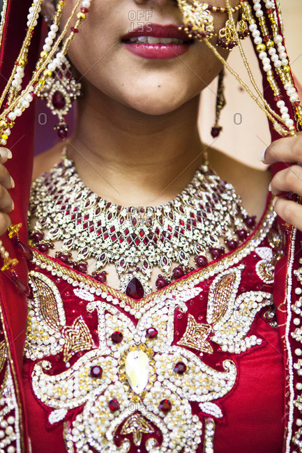 Close-up of Hindu woman getting ready for wedding, Toronto, Ontario, Canada