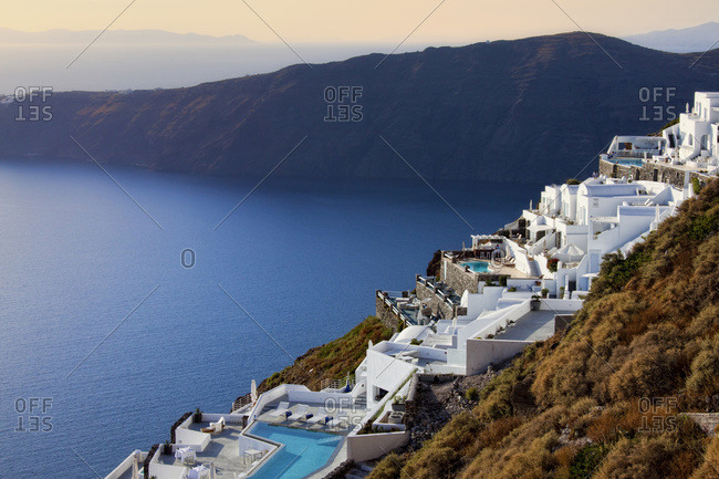Houses and hotels on hillside, Imerovigli, Santorini, Cyclades, Greek Islands, Greece