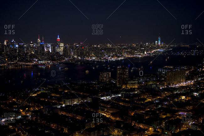 Illuminated cityscape of New York City at night, USA