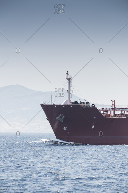 Ship\'s bow and cargo ship, Strait of Gibraltar, Spain