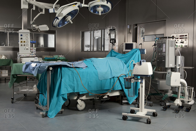 A covered body on a surgical operating table