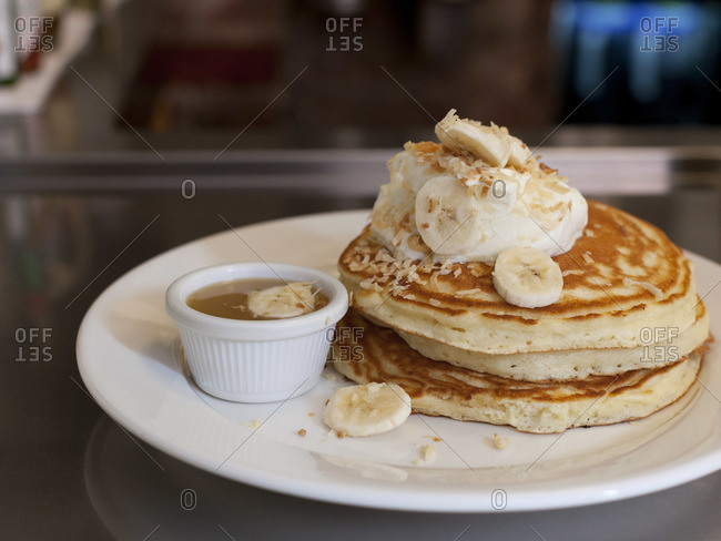 Banana pancakes with Bavarian cream and toasted coconut