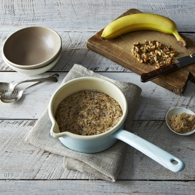 Porridge made of steel-cut oats with walnuts and banana