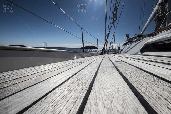 Close up of the teak deck of a sailboat