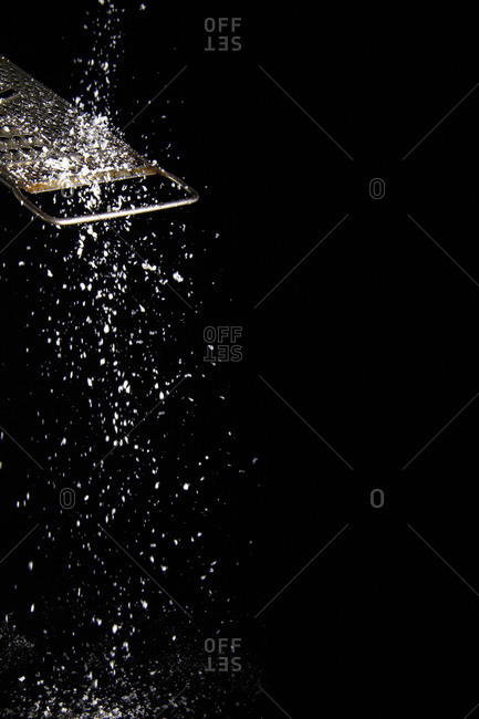 Studio shot of sprinkled powdered sugar