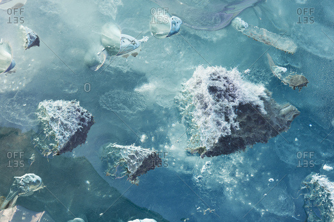 Close up of ice surface of iceberg broken off Mendenhall Glacier floating in Mendenhall lake, Alaska
