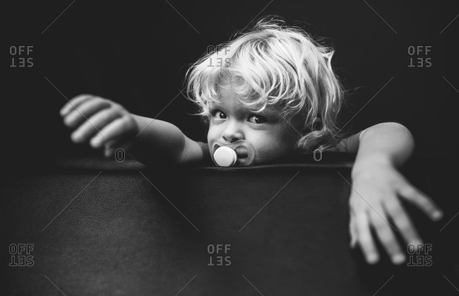Portrait of boy with a pacifier