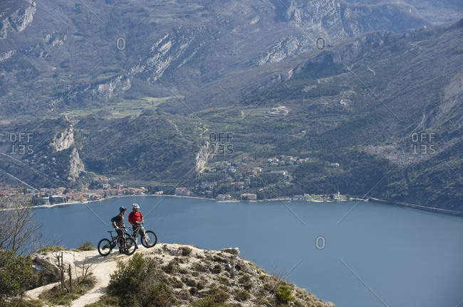 Men with mountain bikes at Lake Garda, Italy