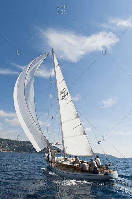 A regatta sails through the waters off Nice