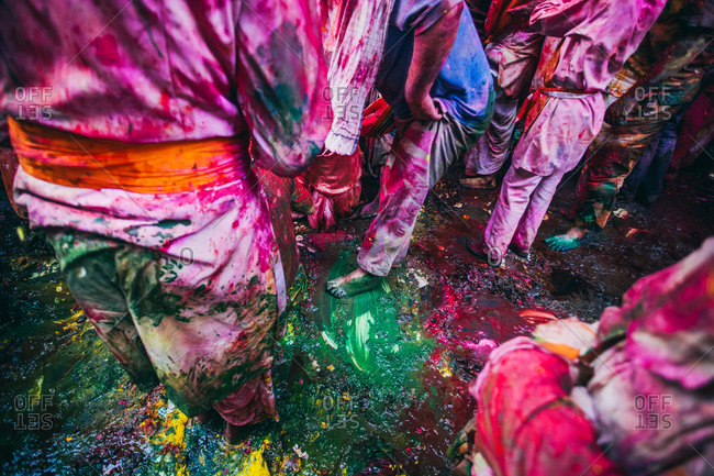 Mathura, Uttar Pradesh, India - February 23, 2010: People soaking in colors at the Braj Holi festival