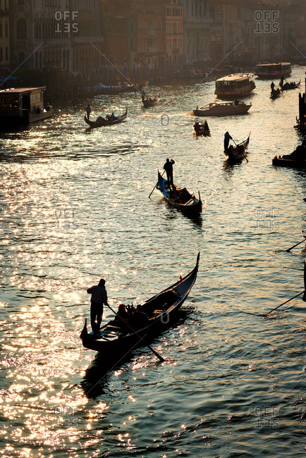 Gondolas on the Grand Canal at sunset, Venice, Italy