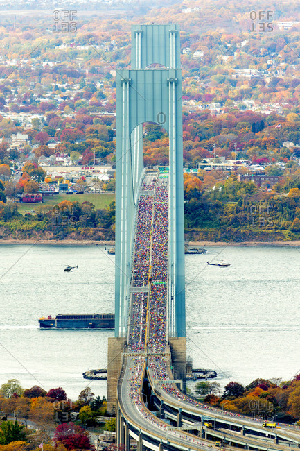 Thousands of marathon runners on Verrazano-Narrows Bridge, NYC, USA
