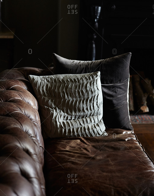 Cushions on an old leather couch