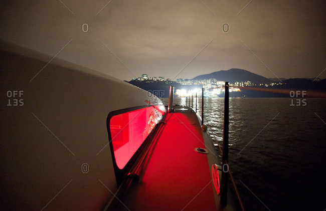 Luxury sailing boat at night, Hong Kong