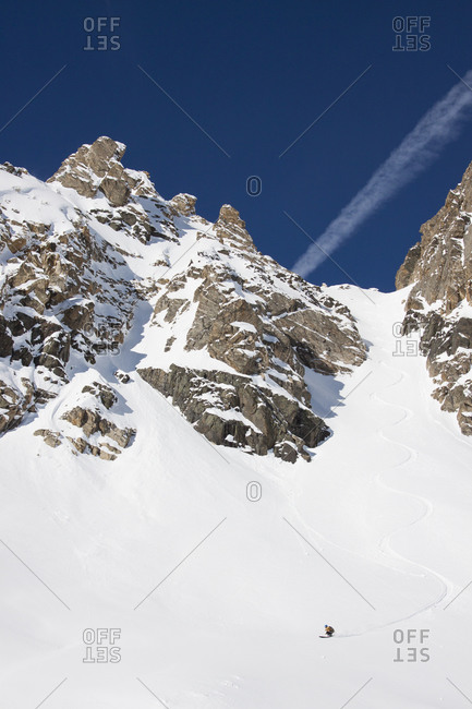 A backcountry skier turns in the Fourth of July�Couloir in the Beehive Basin near Big Sky, Montana