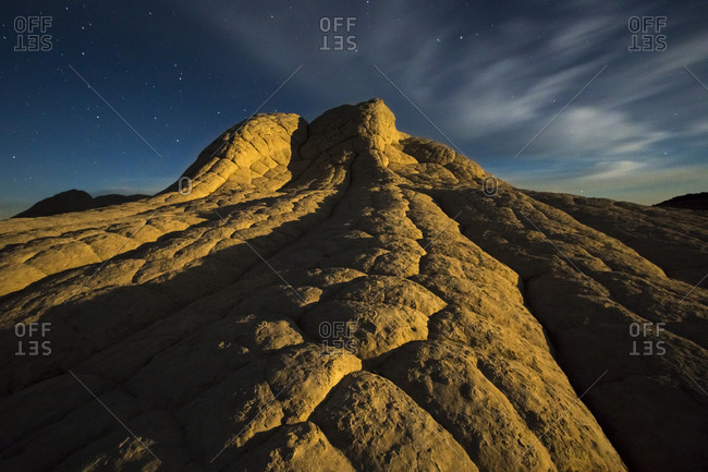 Sandstone formations at moonrise in White Pocket in Arizona