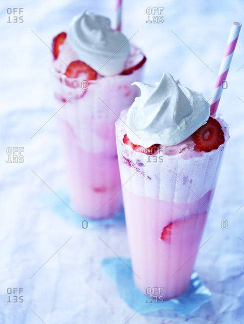 Glasses of strawberry ice cream floats