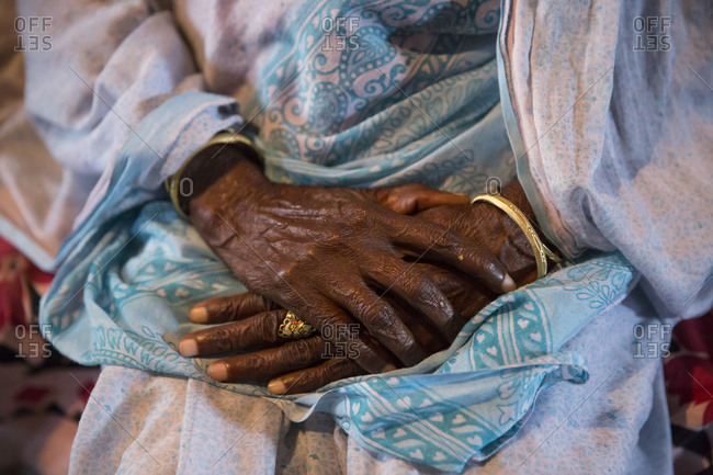 Close up of the hands of an elderly woman in Varanasi, India