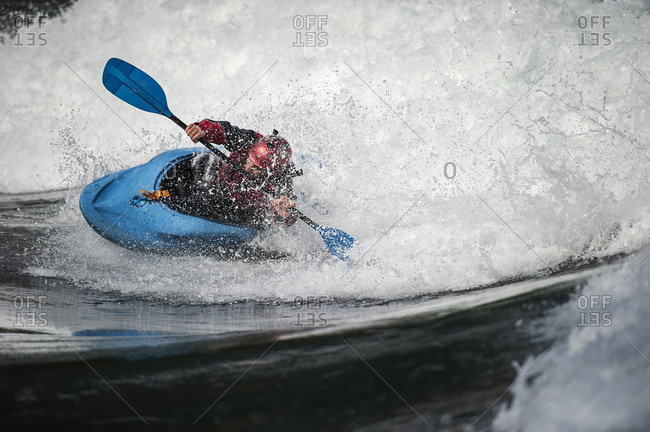 Whitewater rafting on a wave