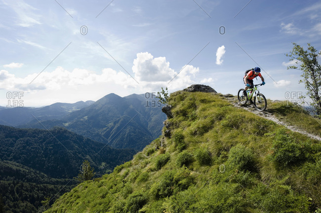 Man biking down a mountain