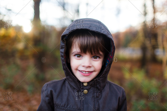 Portrait of boy in hood in fall