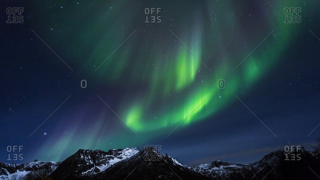Polar lights (aurora borealis) on Gimsoy, Lofoten, Norway