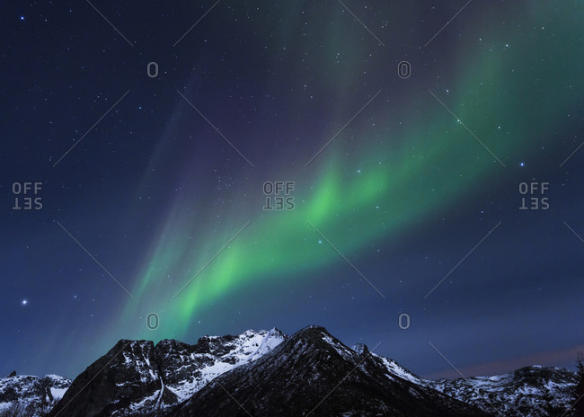 Polar lights (aurora borealis) on Gimsoy, Lofoten, Norway