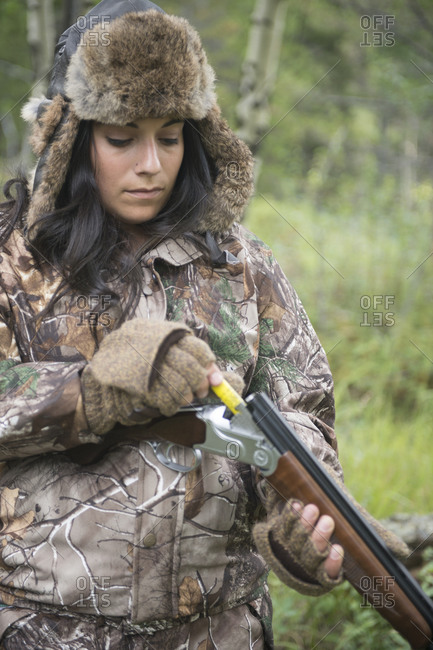 A woman loads a shotgun for upland hunting Small game give inexperienced hunters a chance to learn the skill